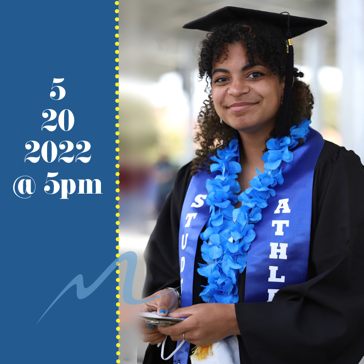 female graduate in cap and gown wearing blue Hawaiian flowers