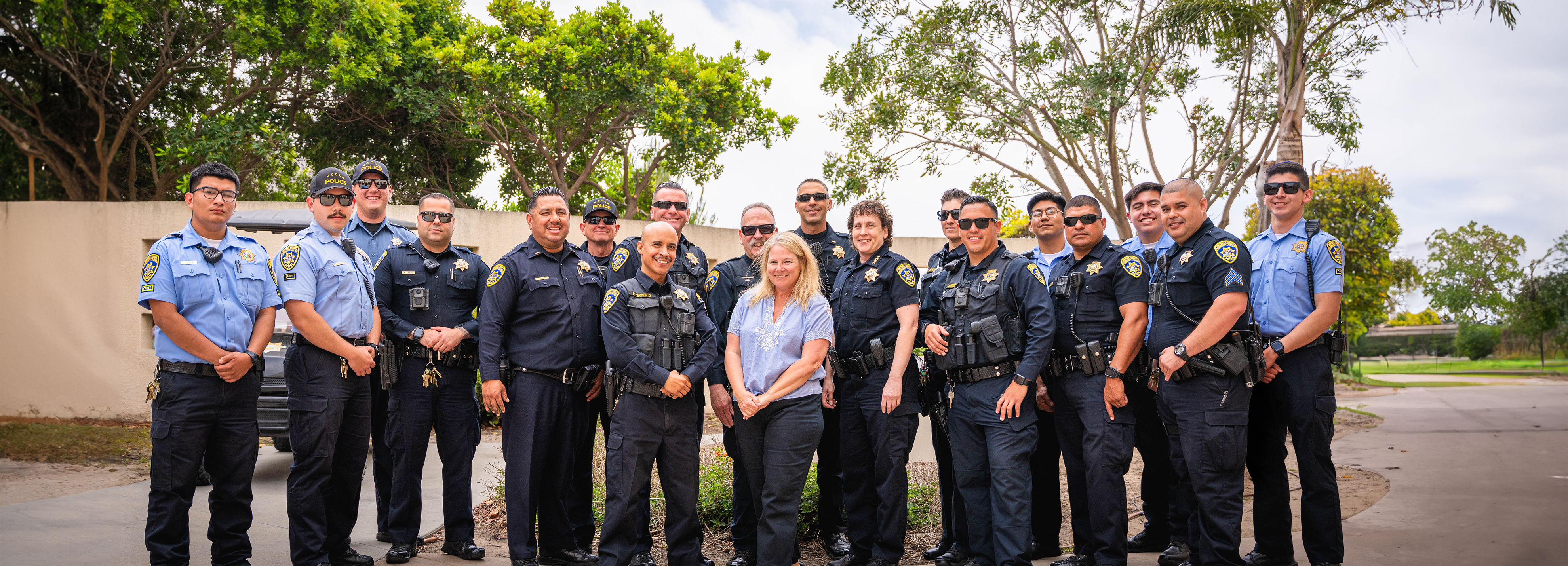 Group photo of VCCCD Police Department personnel, including police officers, safety officers, police cadets, and an administrative assistant.