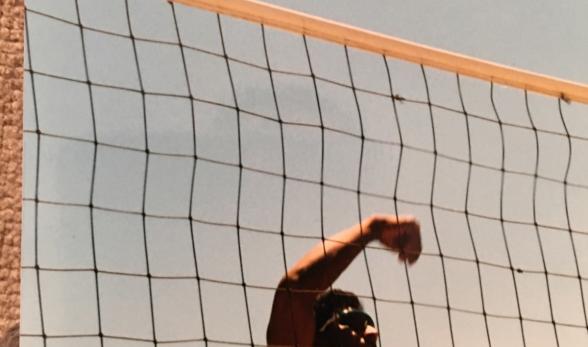 A young Rey Reyes playing volleyball. 