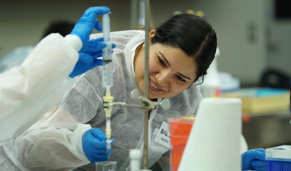 MC student does an experiment in the biotech lab