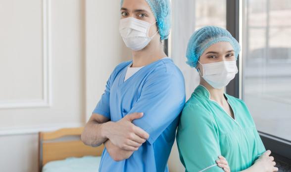 Nurses wearing scrubs and masks