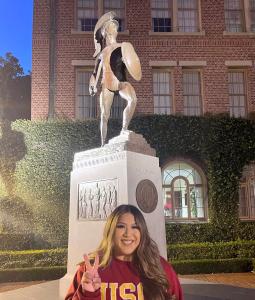 Vanessa Luis Stands in Front of the USC Trojan